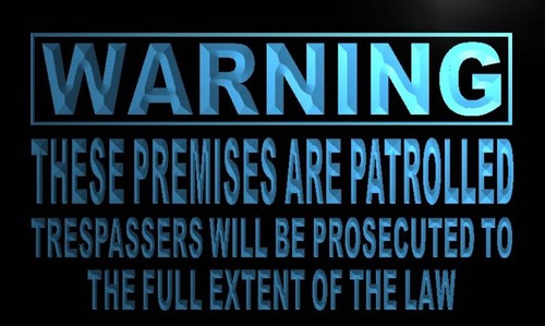 Warning These Premises are Patrolled Neon Sign